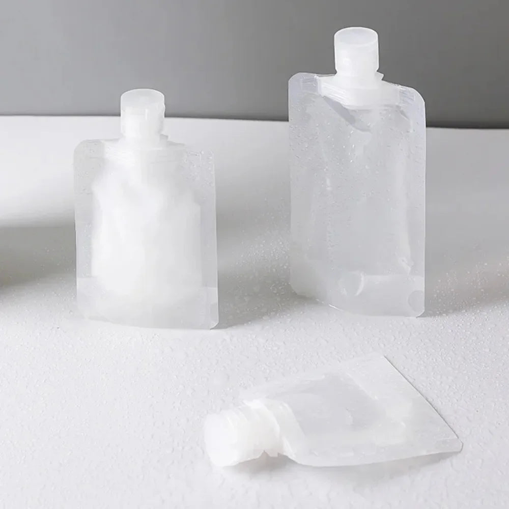 5Pcs Travel Bottles Set – Refillable Squeeze Pouches for Shampoo, Lotion & Liquid Toiletries