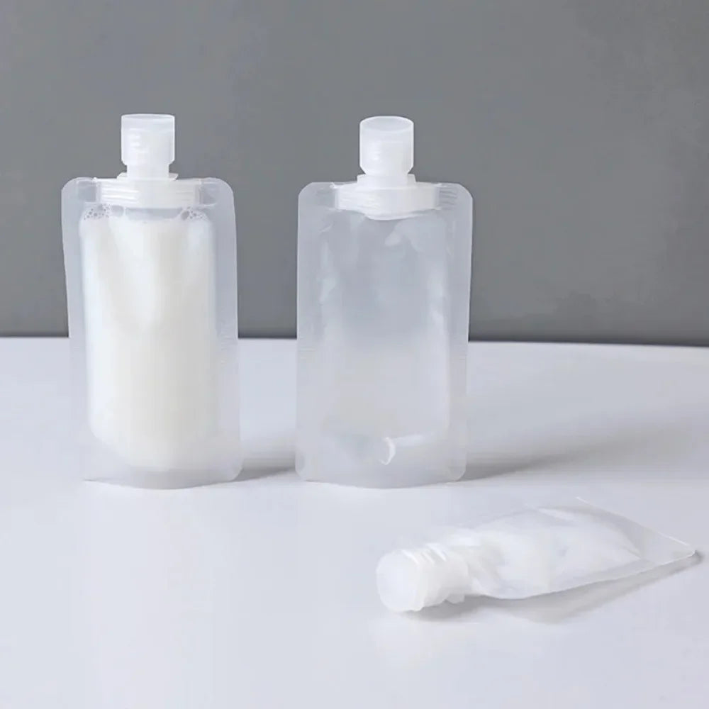 5Pcs Travel Bottles Set – Refillable Squeeze Pouches for Shampoo, Lotion & Liquid Toiletries